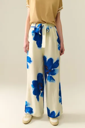 White Palazzo Pants With Blue Tropial Flower Print And Matching Belt