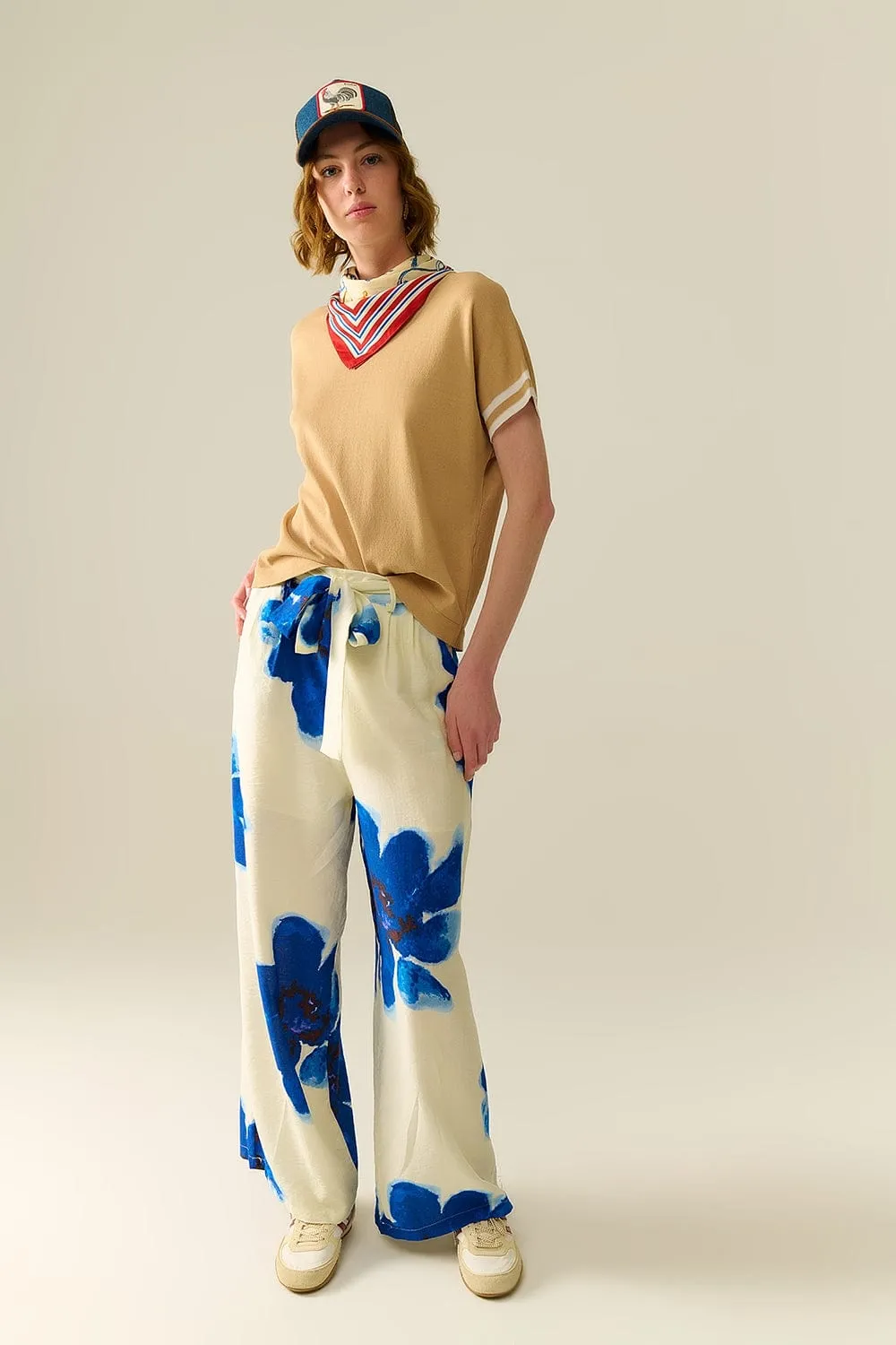 White Palazzo Pants With Blue Tropial Flower Print And Matching Belt